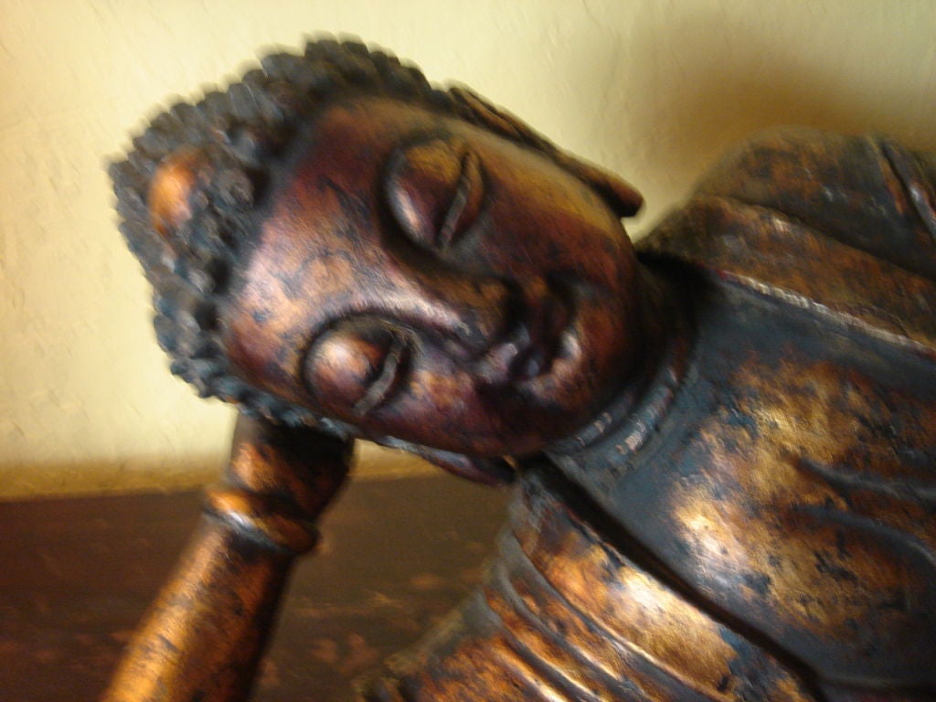 Chinese reclying Buddha hand craved made of poplar wood with copper gold leaf  from Shanxi Province, China