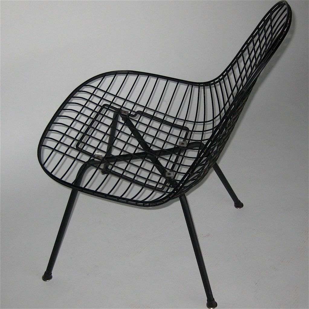 American EARLY LOW LOUNGE X BASE WIRE SHELL CHAIR BY CHARLES EAMES