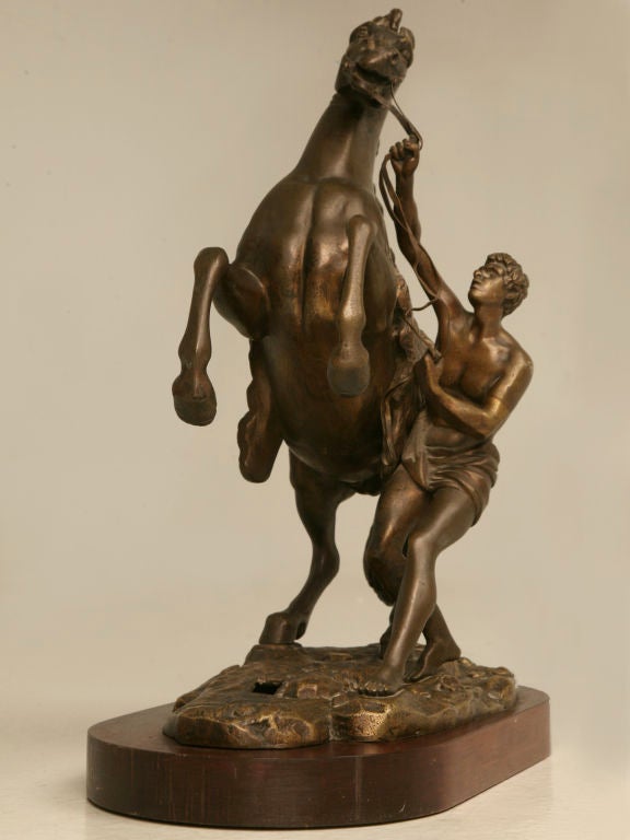 Antique French bronze, late 19th century stallion relief signed, Coulston (image 9). The horse sculpture is very intricately detailed and mounted to a wooden base. It appears to have once been fitted as a lamp, though not anymore (image 9).