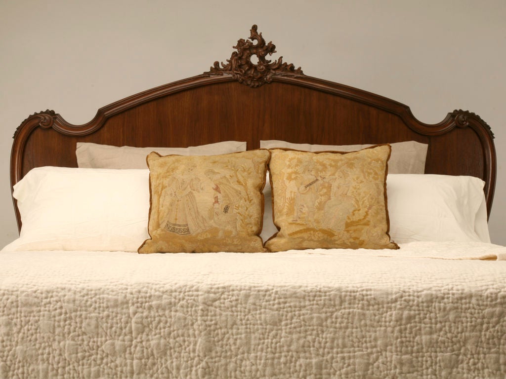 Numerous daunting hours are spent on re-purposing and enlarging one of these exquisite antique headboards to king size. This is a splendid opportunity for you to have a unique, one of a kind antique French walnut king sized bed. As you probably