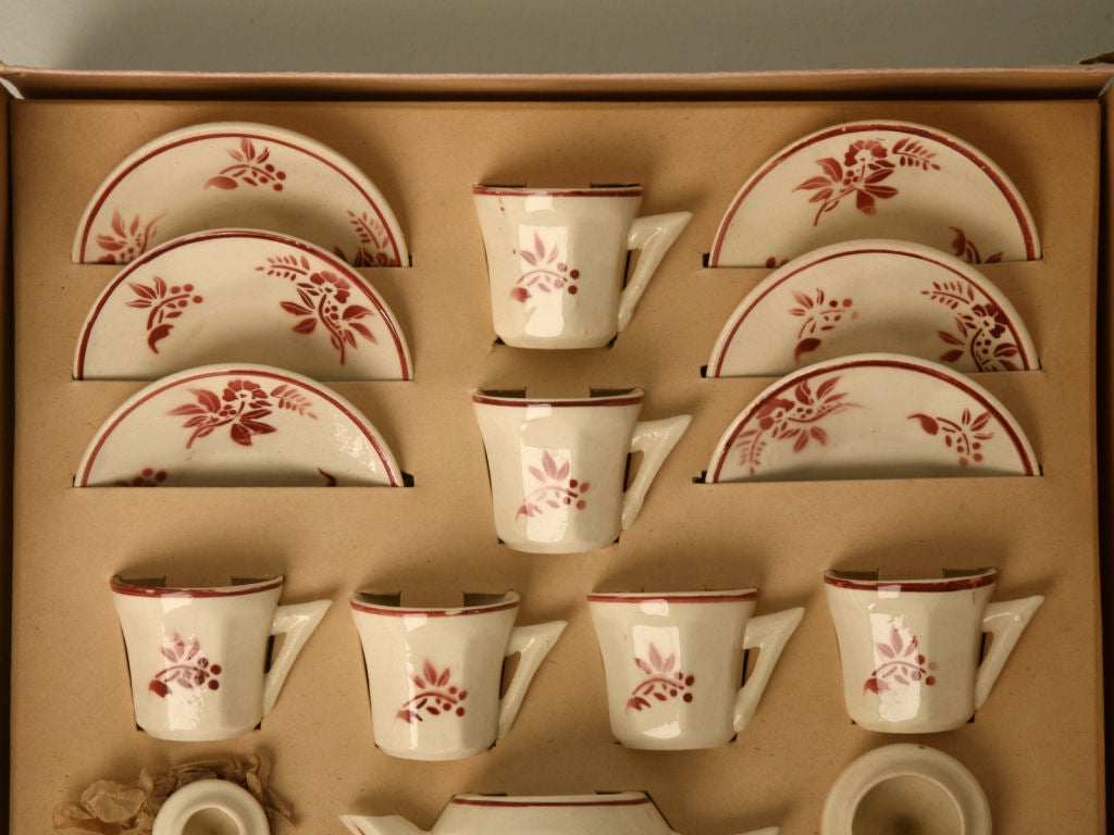 Remarkable vintage French child's tea set for 6 in it's original fitted box. In awesome original condition, this child's tea set is ready for your little prince or princesses next tea party. Originally produced as early as the 1700's, their purpose