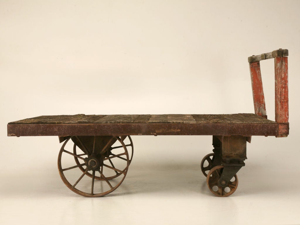 Awesome antique French wood and iron railroad trolley. Originally utilized for transferring freight, baggage, and goods at depots and train stations. We have used this workhorse the past several years here at our shop, moving statues, fountains, and