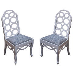 A Pair of Francis Elkins Designed "Loop Chairs"