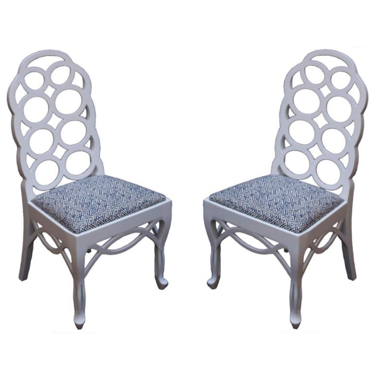 A Pair of Francis Elkins Designed "Loop Chairs"