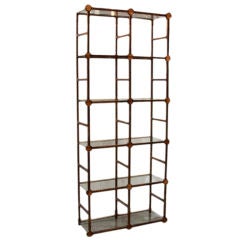 A Five Tier Gilt Metal Etagere With Amber Inserts