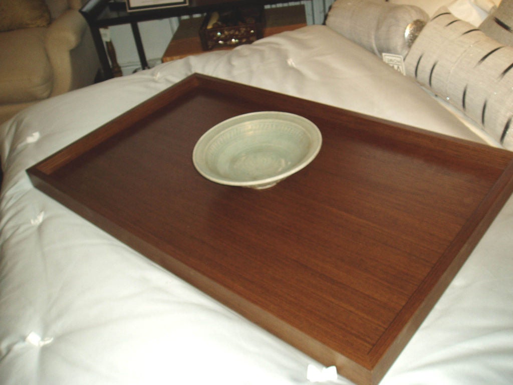 A large wenge wood tray. Wenge wood, from West Africa, reveals a fine but distinctive grain in dark browns.  An elegant serving tray or display platform. Custom sizes available.