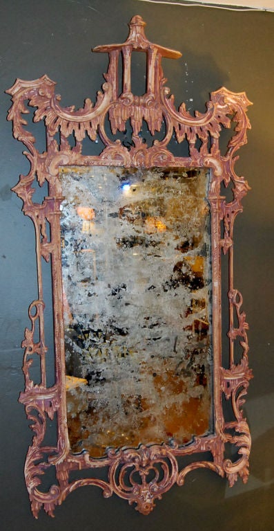 LARGE HAND CARVED WOOD CHINESE CHIPPENDALE STYLE MIRROR.<br />
STAMPED ITALY BACK OF MIRROR.