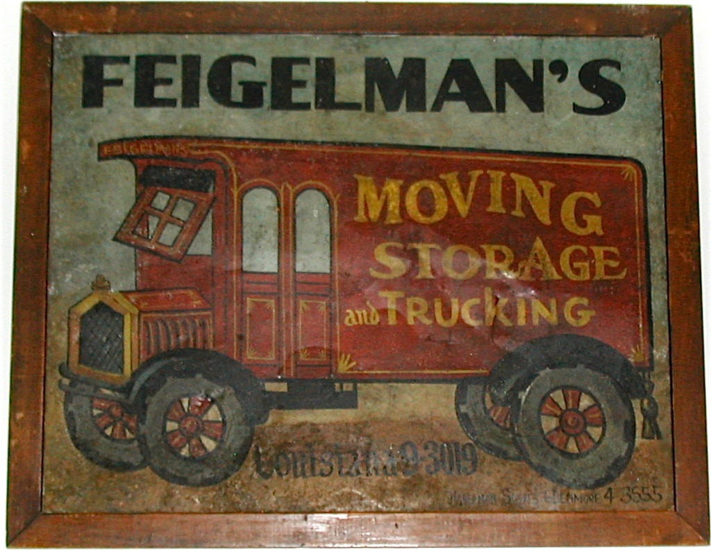 Folk art trade sign painted on tin for Feigelman's Moving , Storage and Trucking Co. Strikingly graphic advertising for a moving company, signed by maker. The windshield might not pass today's inspection requirements ..folky and funny.