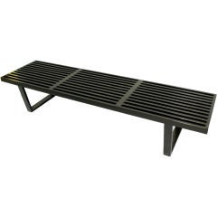 A Three Section Ebonized Maple Slat Bench by George Nelson