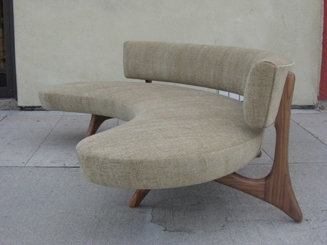 Mid-20th Century Floating Curved Sofa on Elegant Carved Base