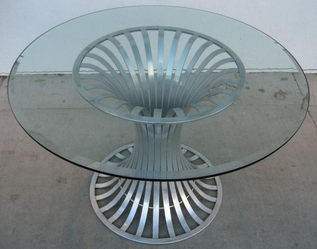 Aluminum Tulip form base by Russell Woodard with thick beveled glass top.