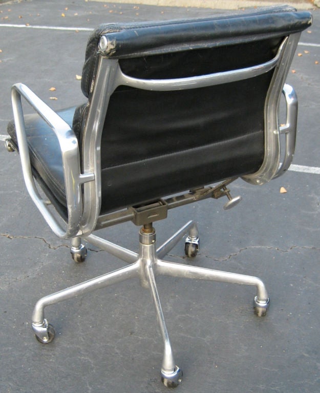 Pair of Well Worn Eames Soft Pad Management Chairs
