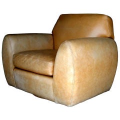Grand Pair of Well Worn Leather Swivel Club Chairs