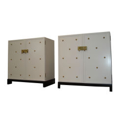 High Pair of White Lacquered Studded Cabinets