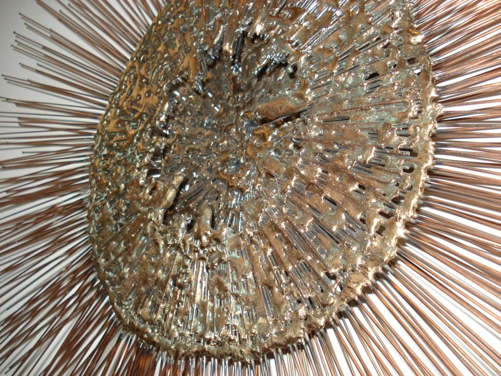 Amazing 2 layers of copper, brass and dripped bronze sunburst wall sculpture.