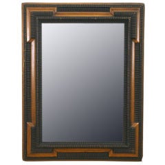 A Dutch Baroque Inspired Italian Light Walnut &Ebonized Mirror