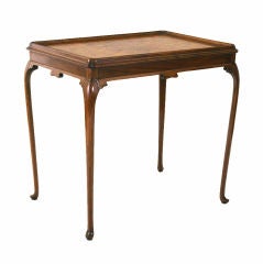 A Continental  Walnut and Veneered Late Neoclassical Side Table