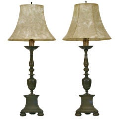 A Pair of Italian Louis XIII Style Patinated Bronze Torcheres