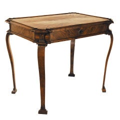 An Italian Walnut and Veneered Neoclassical Period Center Table