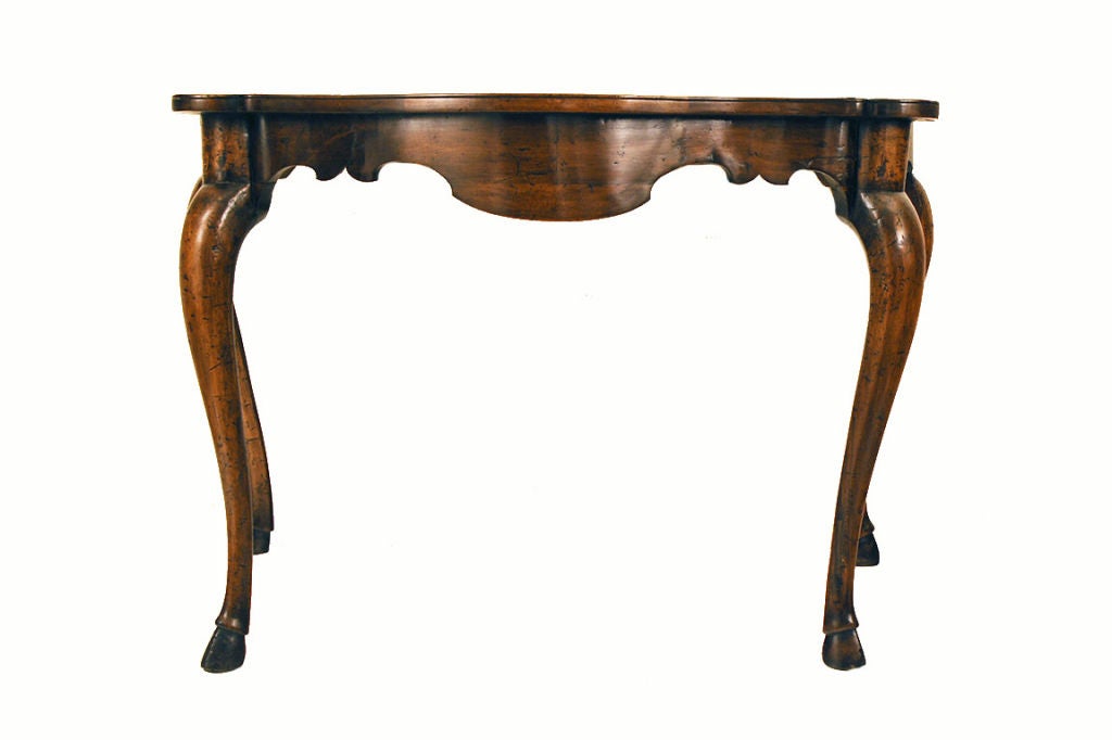An Italian, Ferrara, Carved Walnut Rococo Console