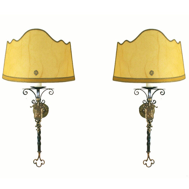 A Pair of Wrought Iron and Brass Shield-Form Wall Sconces