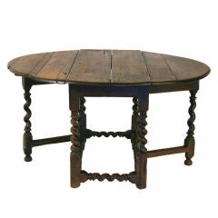An Italian Louis XIII Period Oak Gateleg Table