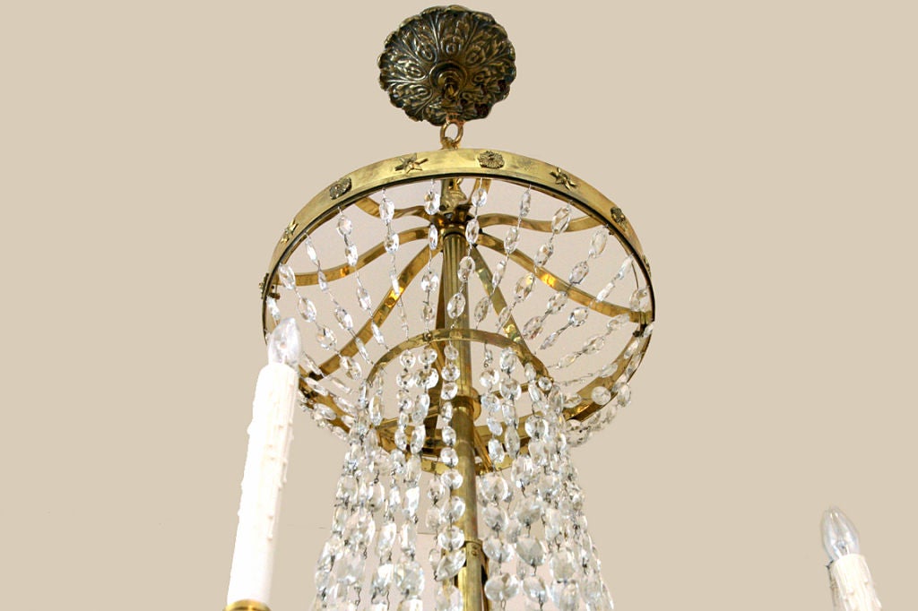 A Tall Italian Empire Style Brass 10-Light Chandelier