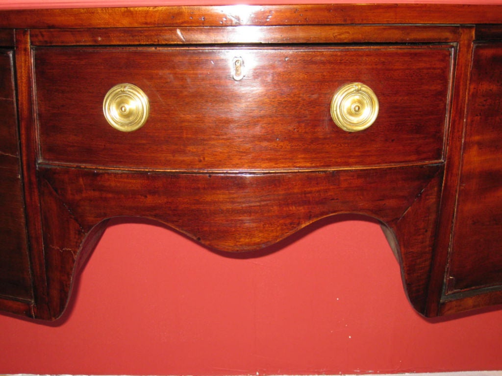 English Mahogany Side Board With Serpentine Front