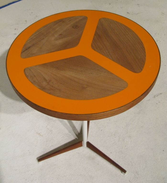 Adjustable side table by Howard McNab and Don Savage for Peter Pepper Products of Palos Verdes, CA, c. 1962.  The technique of inlaying wood and plastic laminate was innovative.  Shown in California Design Eight, 1962.  Adjusts from H17