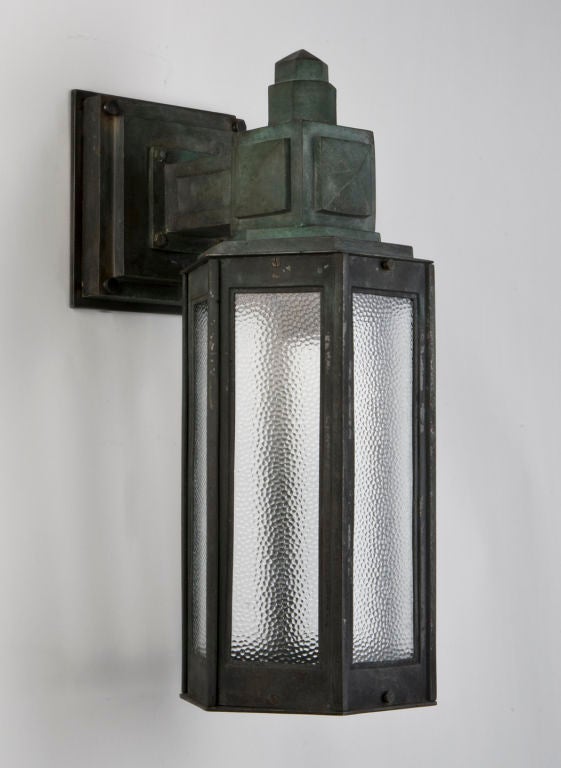 A pair of antique hexagonal bronze exterior lanterns