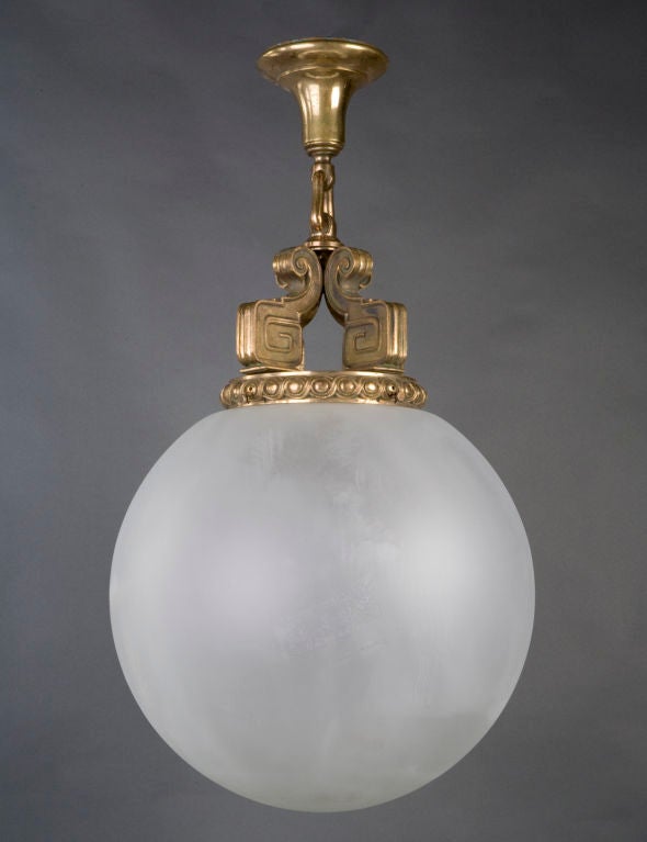 HL3489<br />
A semi-flush pendant having neoclassically detailed cast bronze metalwork and a frosted glass sphere globe. The hand-blown glass, an addition by the Remains Lighting workshop.<br />
<br />
Current height: 33