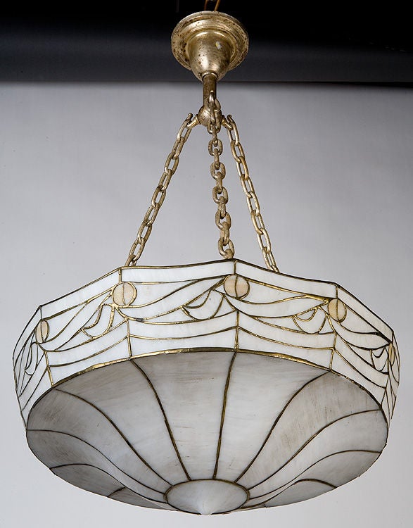 Brass An antique leaded glass inverted dome chandelier