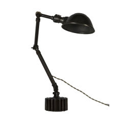 A vintage adjustable table lamp
