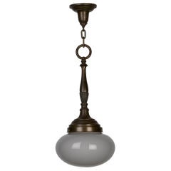 An antique bronze pendant fixture
