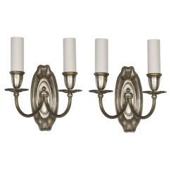 A pair of Antique nickelplate double-light sconces