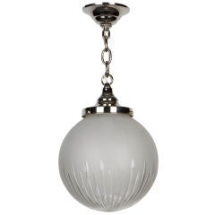 A wheel-cut frosted globe pendant