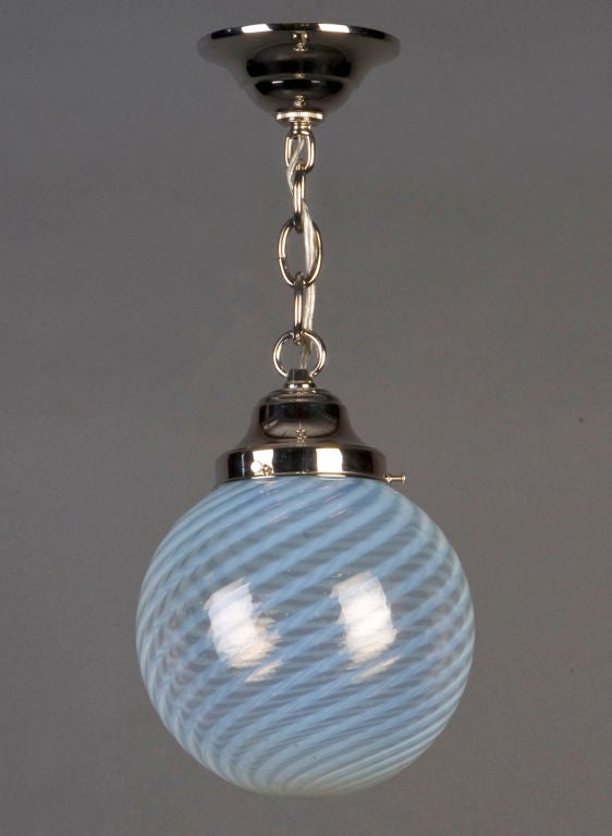 An antique opalescent glass pendant
