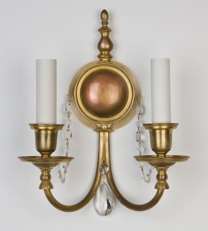 A pair of antique gilded Bradley and Hubbard sconces