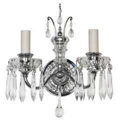 A pair of vintage chrome and crystal double-light sconces