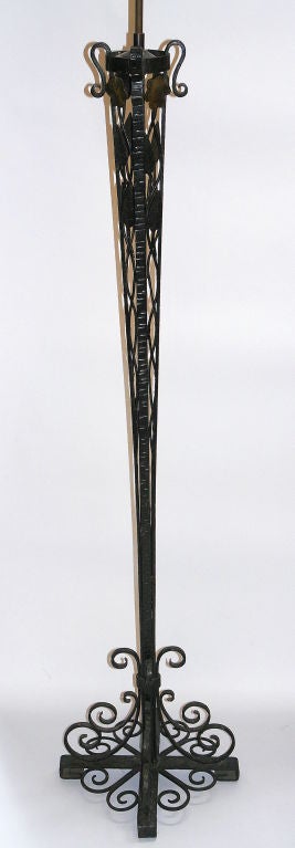 A circa 1900 English Arts and Crafts wrought iron floor lamp with scrolling and foliage motif.
Measurements:
Height of body:  61.5