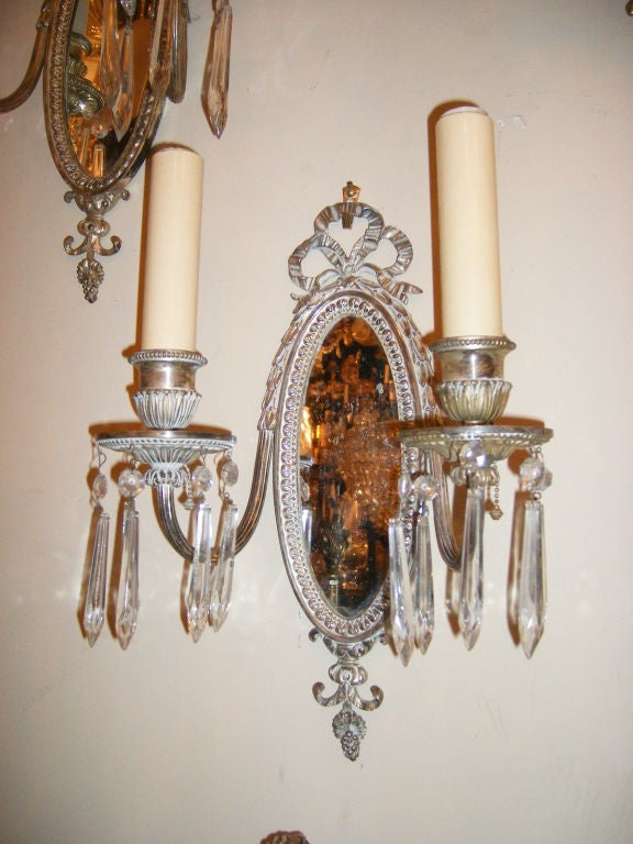 Pair of Mirrored Back Silver Sconces