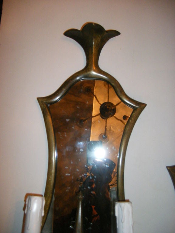 Patinated Pair of Bronze Sconces with Mirror Back For Sale