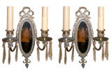 Pair of Mirrored Back Silver Sconces