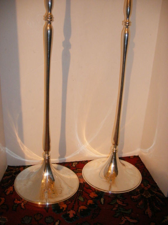Pair of English silver plated table lamps with original finihs and patina. Body shaped as a tapering column.<br />
46