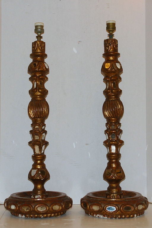 Pair of 19th century Italian candlesticks with mirror insets and electrified to be used as table lamps.

Measurements:
Height of body 26