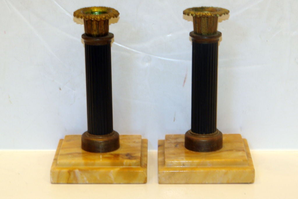 A pair of 19th century Swedish candlesticks with marble bases.

Measurements
Height: 6.5