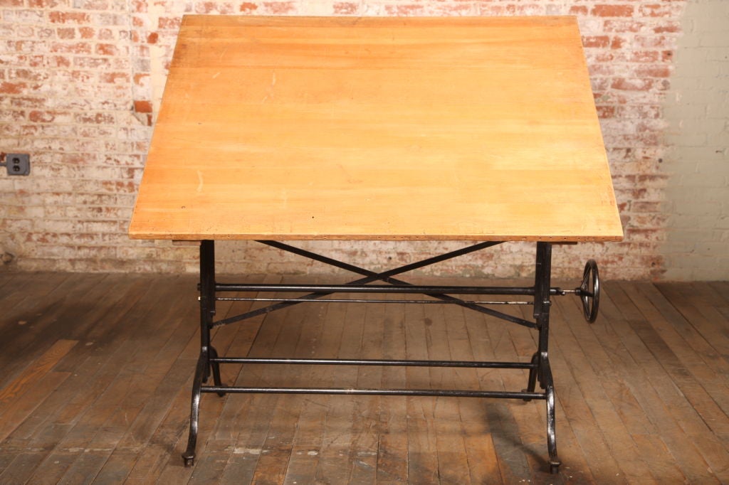 Vintage Adjustable Drafting Table with a Case Iron Base. Table top 52