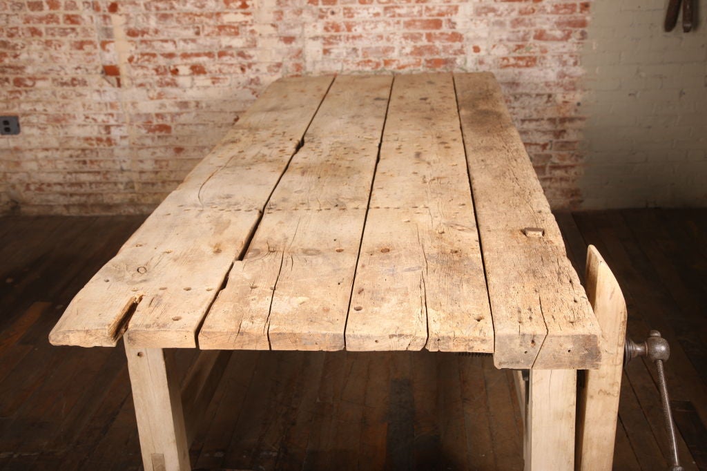 Authentic vintage Carpenter's wooden workbench, vintage Industrial work table, desk with vise.