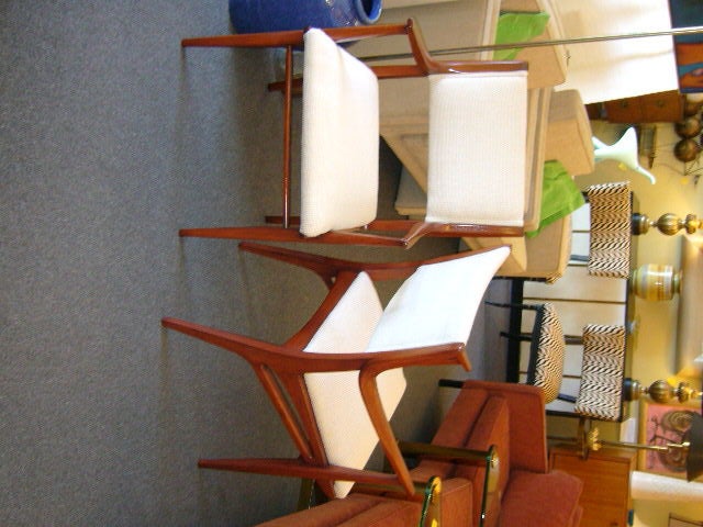 SOLD DEC 2010 Sculptural and modern, these Drexel armchairs from the John Van Koert designed Profile Line exhibit true & fine 1950's styling DNA with their swooping shaped arms and amoeba pierced carved side apron. The line began in 1955 and was