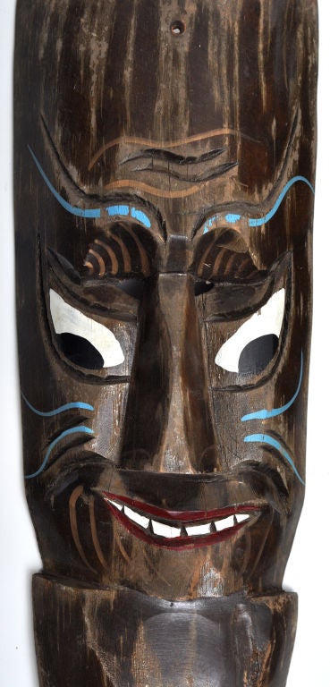 Mid-20th Century SET OF FOUR TIKI MASKS CIRCA 1950S